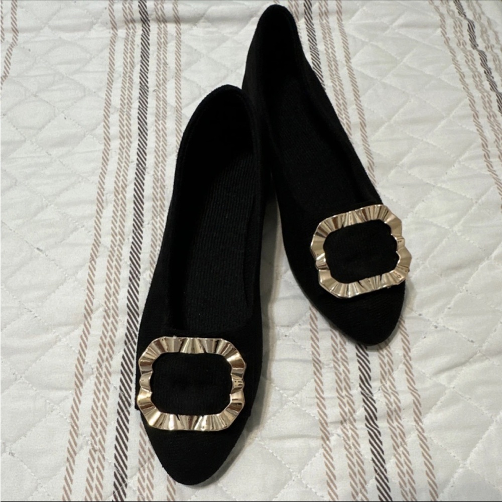 Chic Black Loafers with Gold Accent